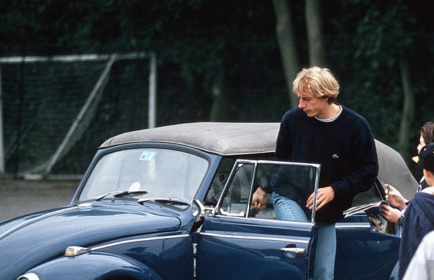 Jurgen into his classic Beetle car