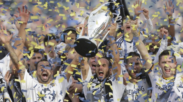Landon lifts MLS trophy along with LA Galaxy teammates
